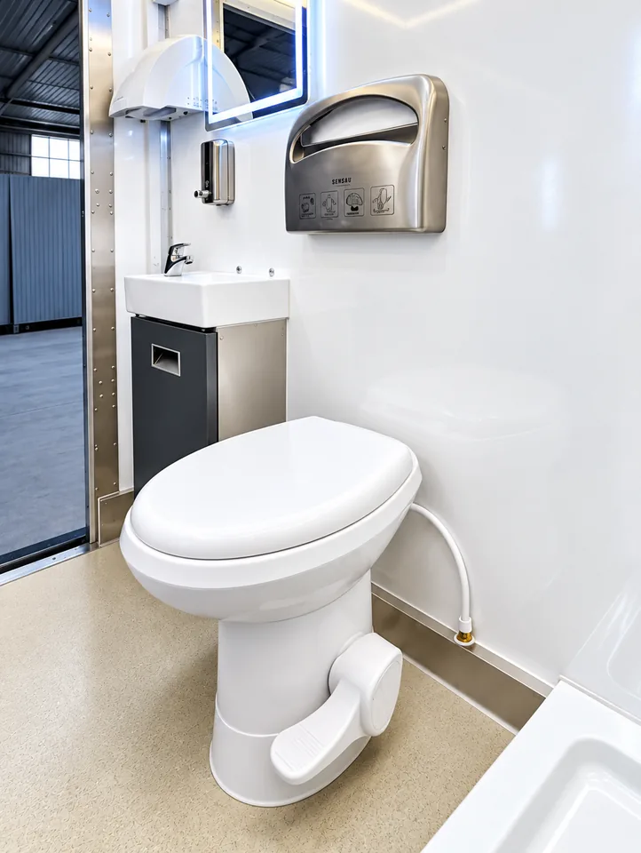 Interior of a commercial mobile restroom trailer