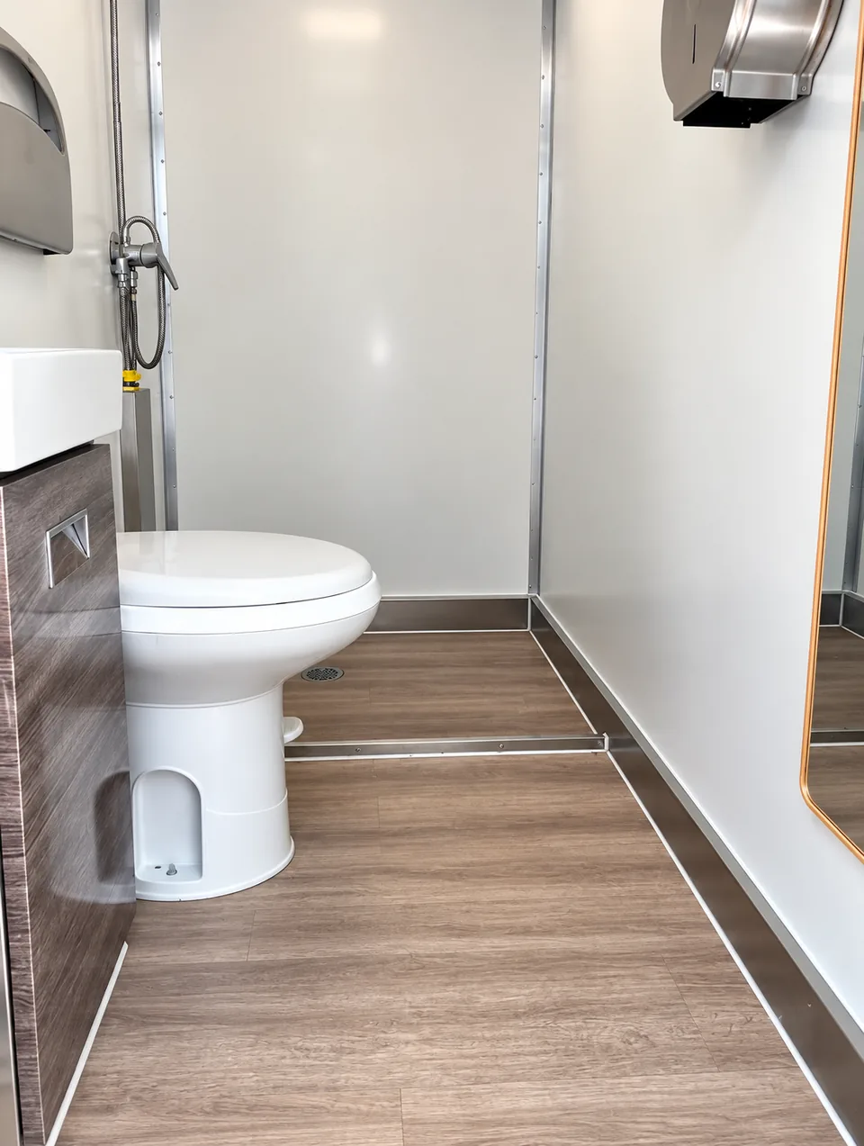 Portable restroom bathroom trailer for a temporary facility